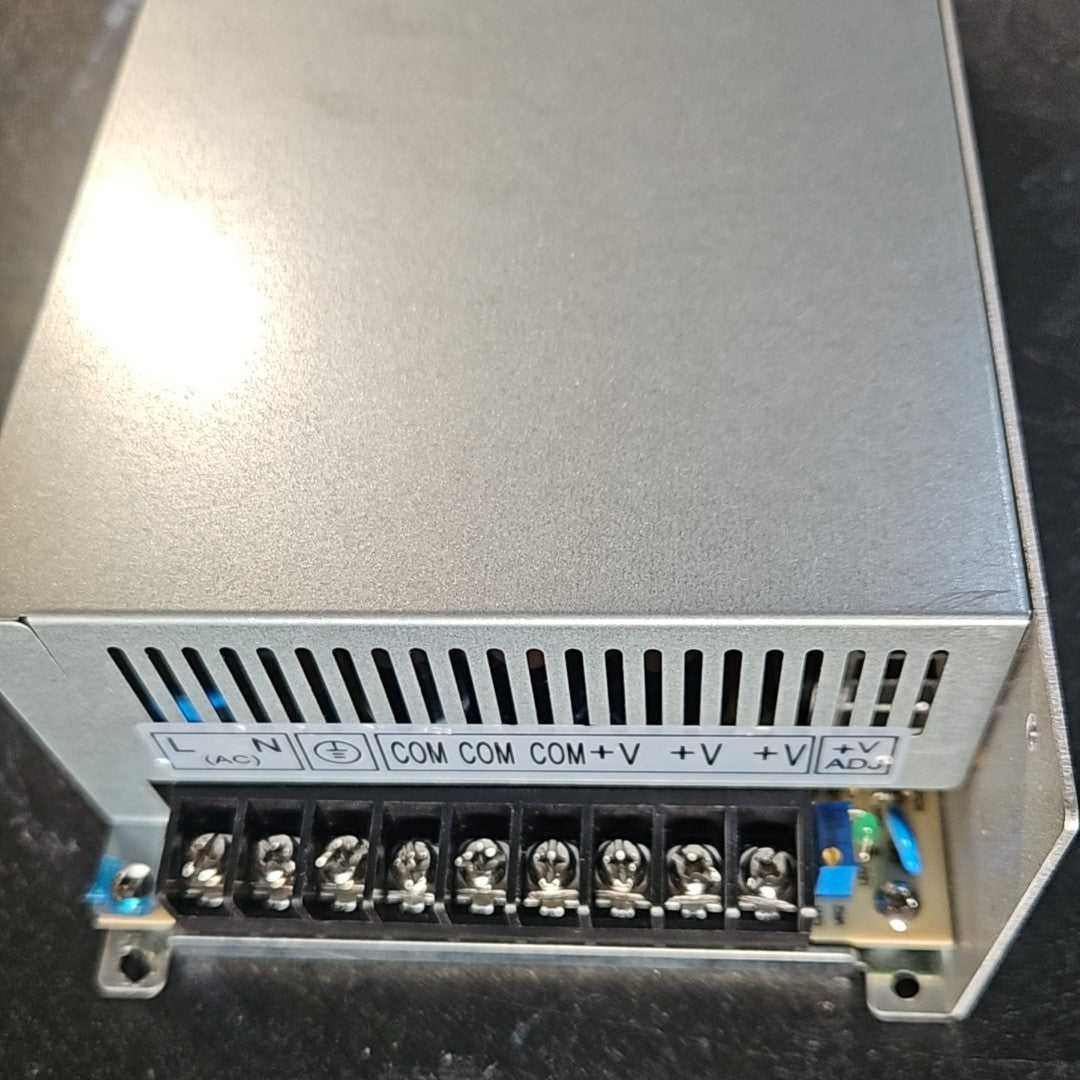 Power Board by Printomize America, featuring a 220V to 42V 15A power conversion with terminals for connection.