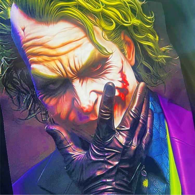 An artistic illustration of a character with vivid colors and intricate details designed for Hyper Bright DTF Transfers by Printomize America.