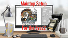 Eyas2 MainTop Settings setup displayed on a computer screen with an artistic design, featuring a colorful dragon graphic for Printomize America, accompanied by workspace elements including a desk lamp, keyboard, and printed materials.